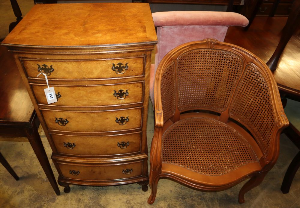 A cane French style elbow chair and a reproduction bow front chest, W.51cm, D.40cm, H.105cm